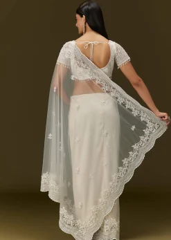 White Net Saree With All Over Embroidery