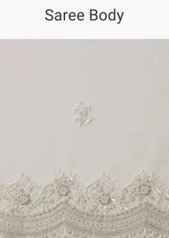 White Net Saree With All Over Embroidery