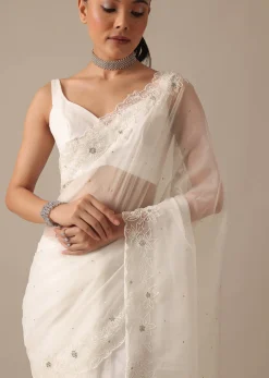 White Organza Saree With Cutdana Work And Unstitched Blouse Piece