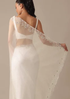 White Organza Saree With Cutdana Work And Unstitched Blouse Piece