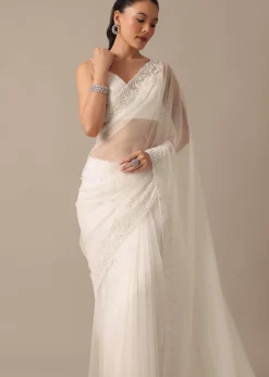 White Organza Saree With Bead Work Border And Unstitched Blouse Piece