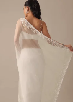 White Organza Saree With Bead Work Border And Unstitched Blouse Piece