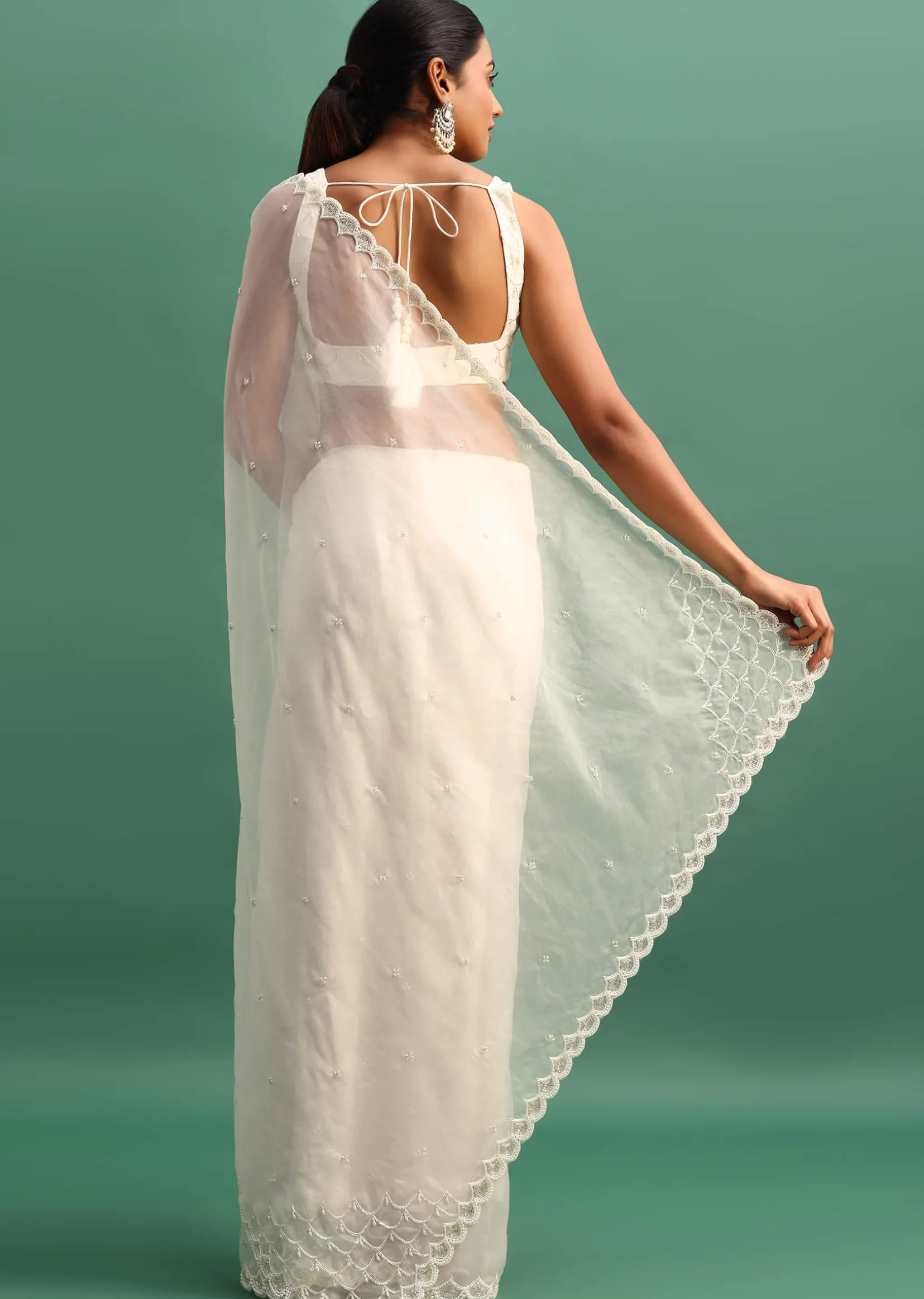 White Organza Saree With Beads And Cutdana Embroidery And Unstitched Blouse