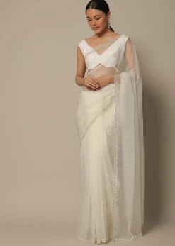 White Organza Saree With Scallop Cutdana Border And Unstitched Blouse Piece