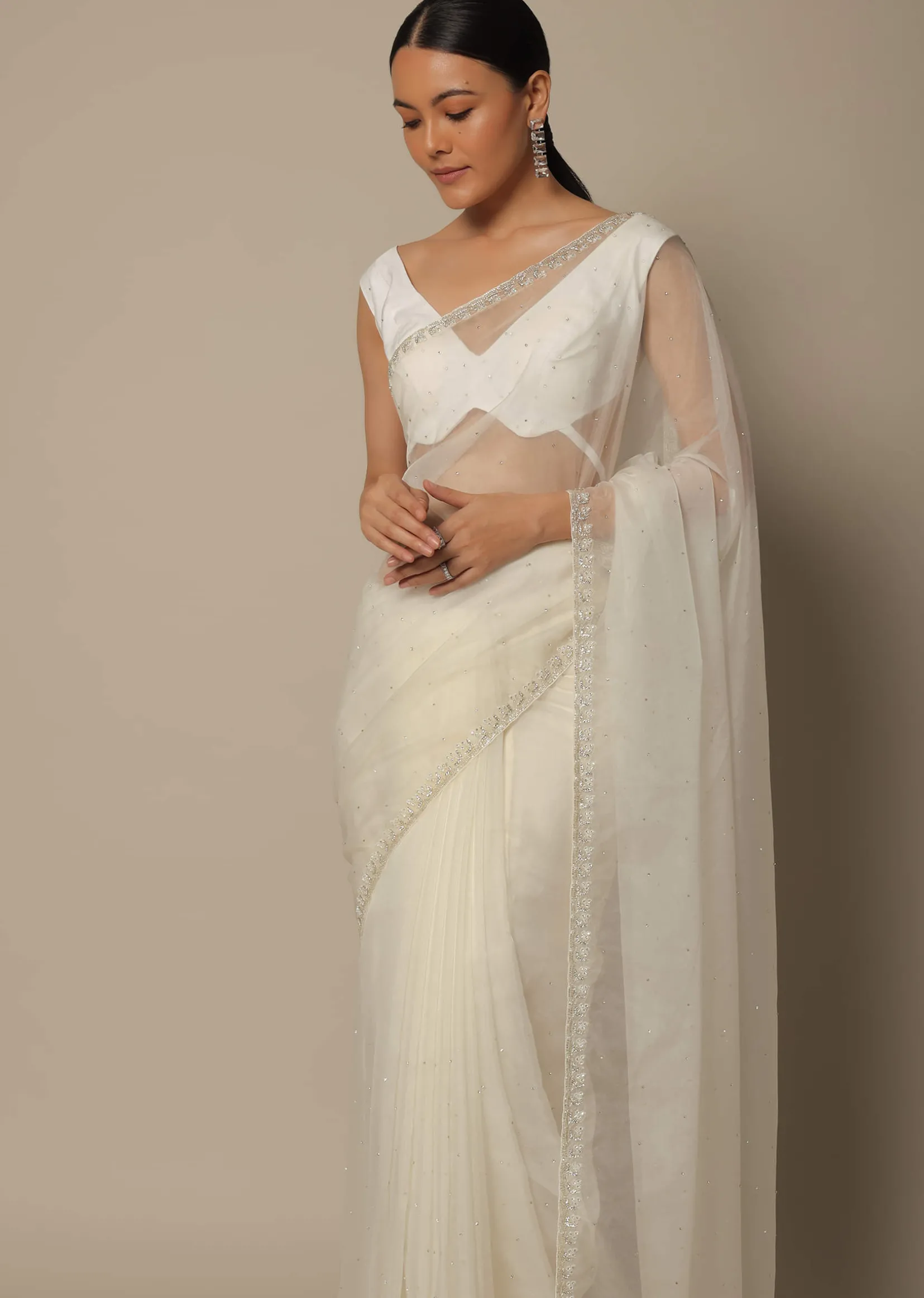 White Organza Saree With Scallop Cutdana Border And Unstitched Blouse Piece