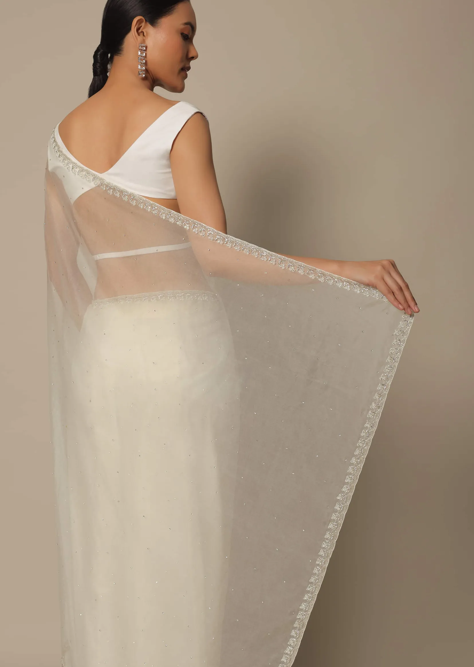 White Organza Saree With Scallop Cutdana Border And Unstitched Blouse Piece