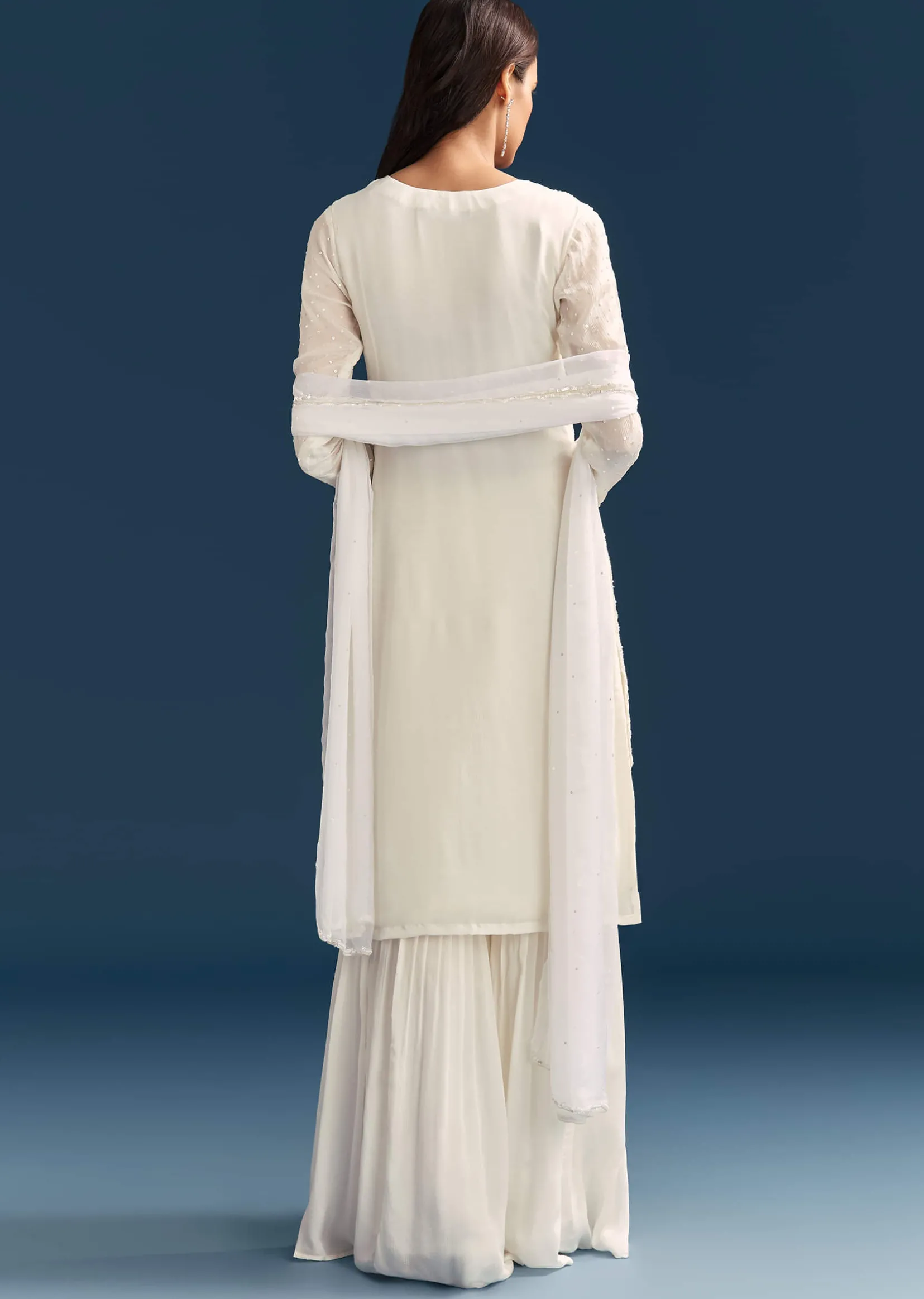 White Pakistani Sharara Suit With Sequin Details And Dupatta
