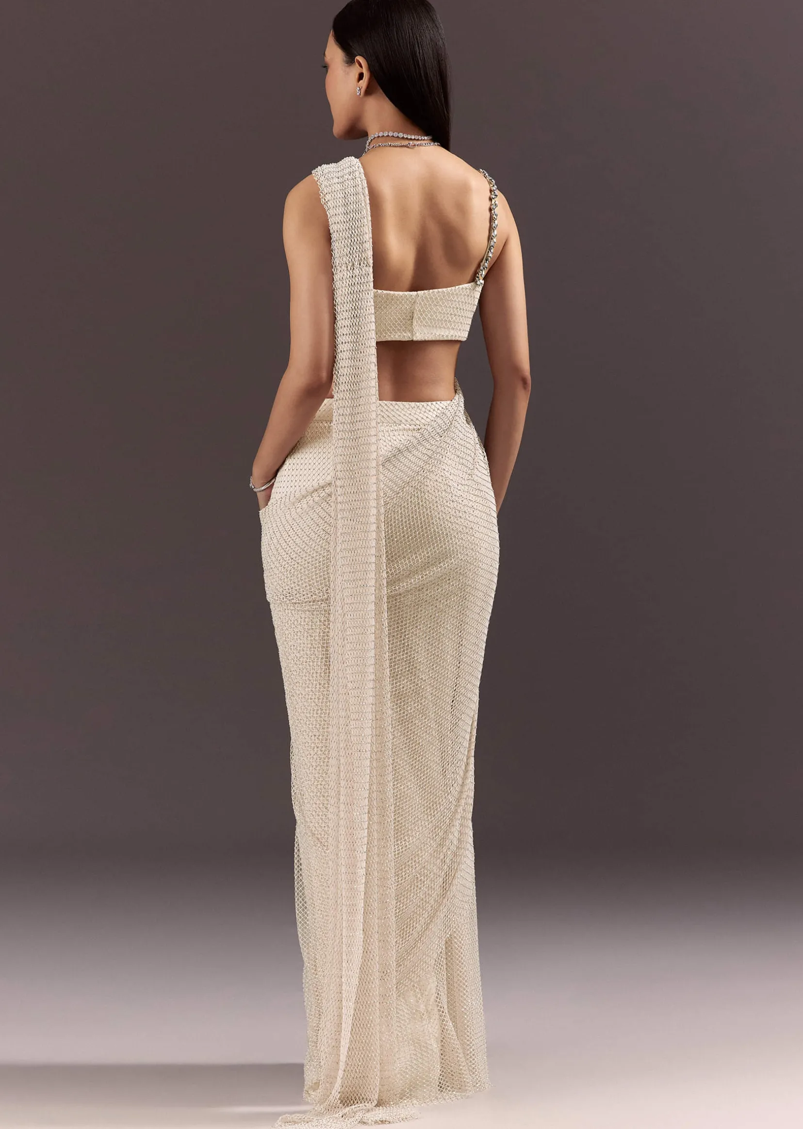 White Pre Draped Saree With Crystal Work And Cowl Blouse