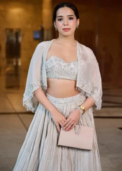 White Ruched Lehenga With Spaghetti Blouse And Cape