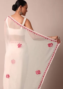 White Saree With Floral Embroidery And Unstitched Blouse Piece