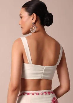 White Saree With Floral Embroidery And Unstitched Blouse Piece