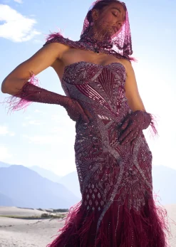 Wine Mermaid Feather Trail Gown With Embroidered Gloves And Veil