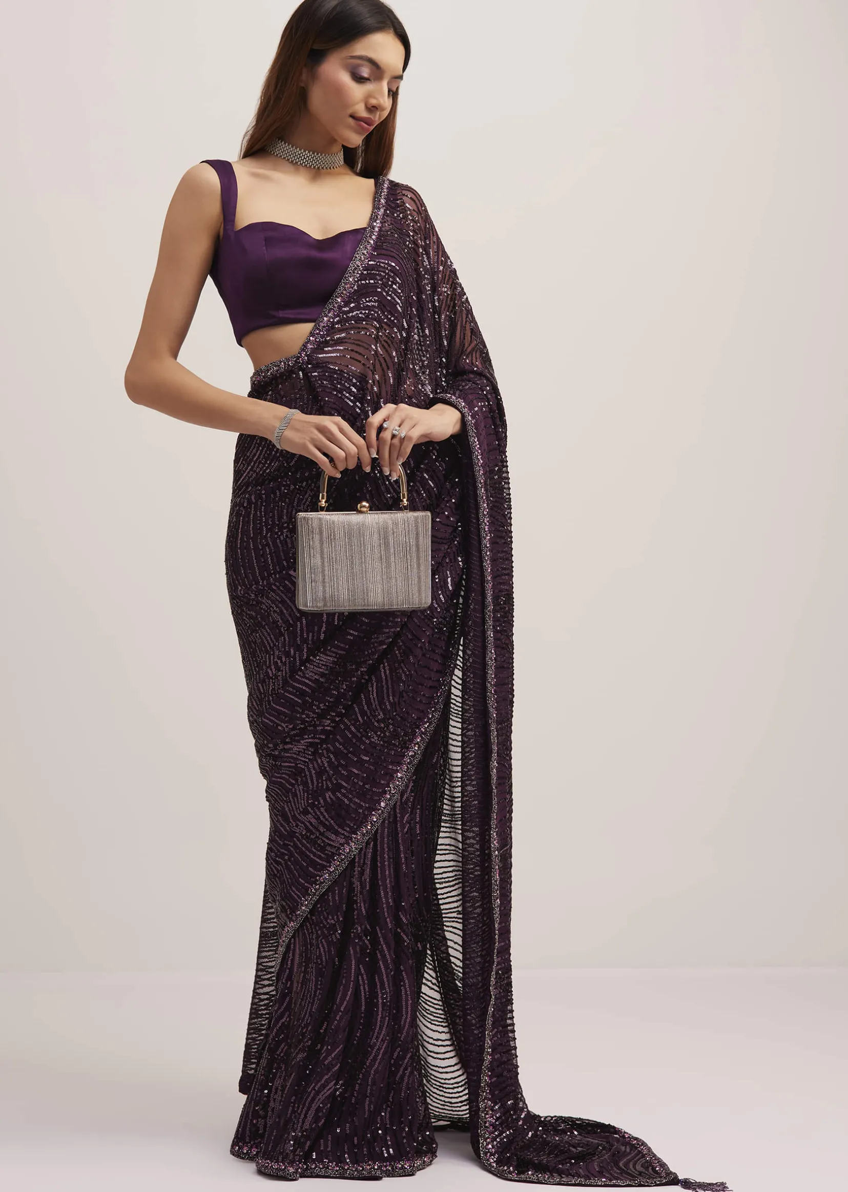 Wine Purple Sequins Saree With An Embellished Border