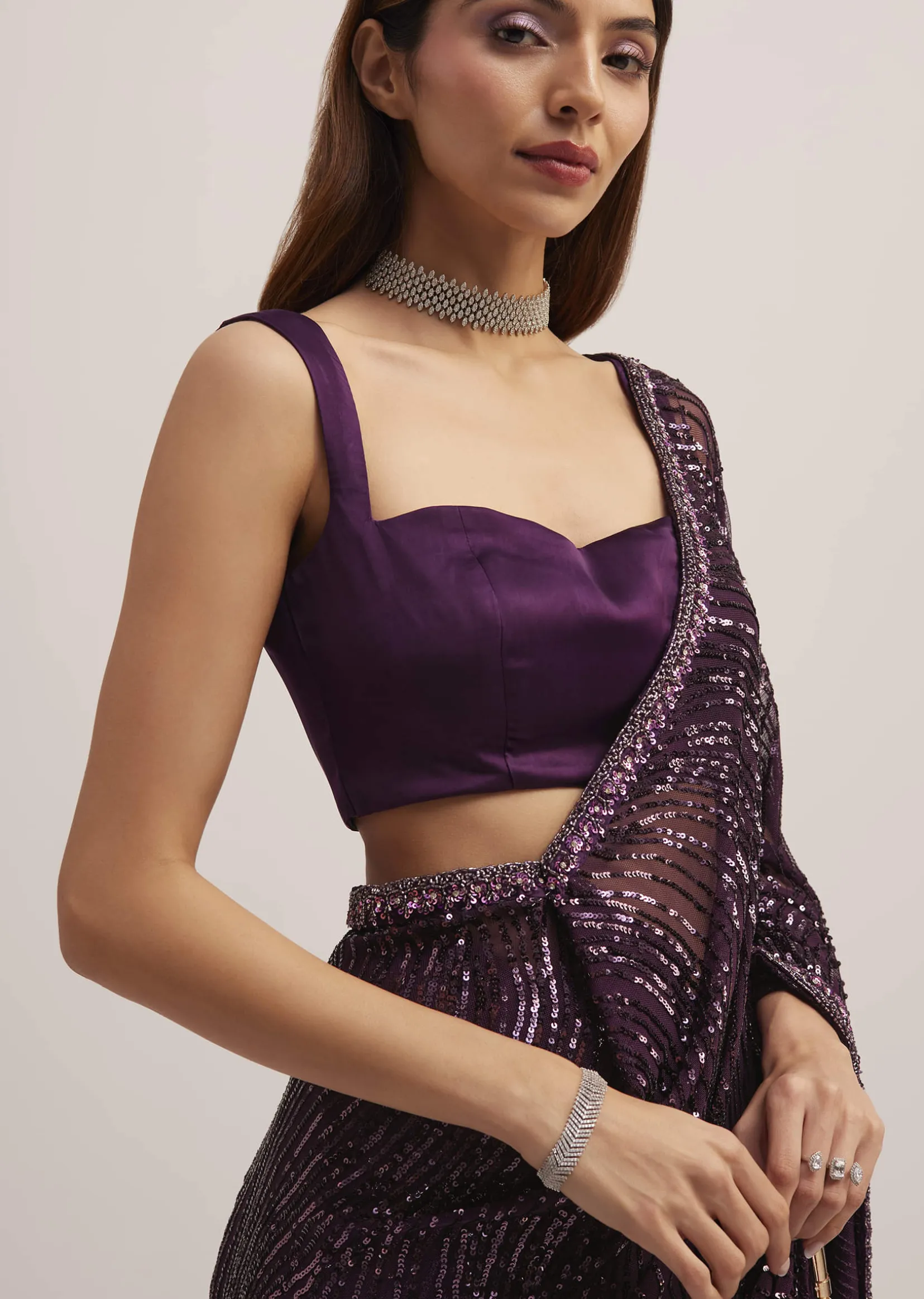 Wine Purple Sequins Saree With An Embellished Border
