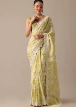 Yellow Printed Satin Saree With Embroidered Detail And Unstitched Blouse Piece