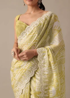 Yellow Printed Satin Saree With Embroidered Detail And Unstitched Blouse Piece