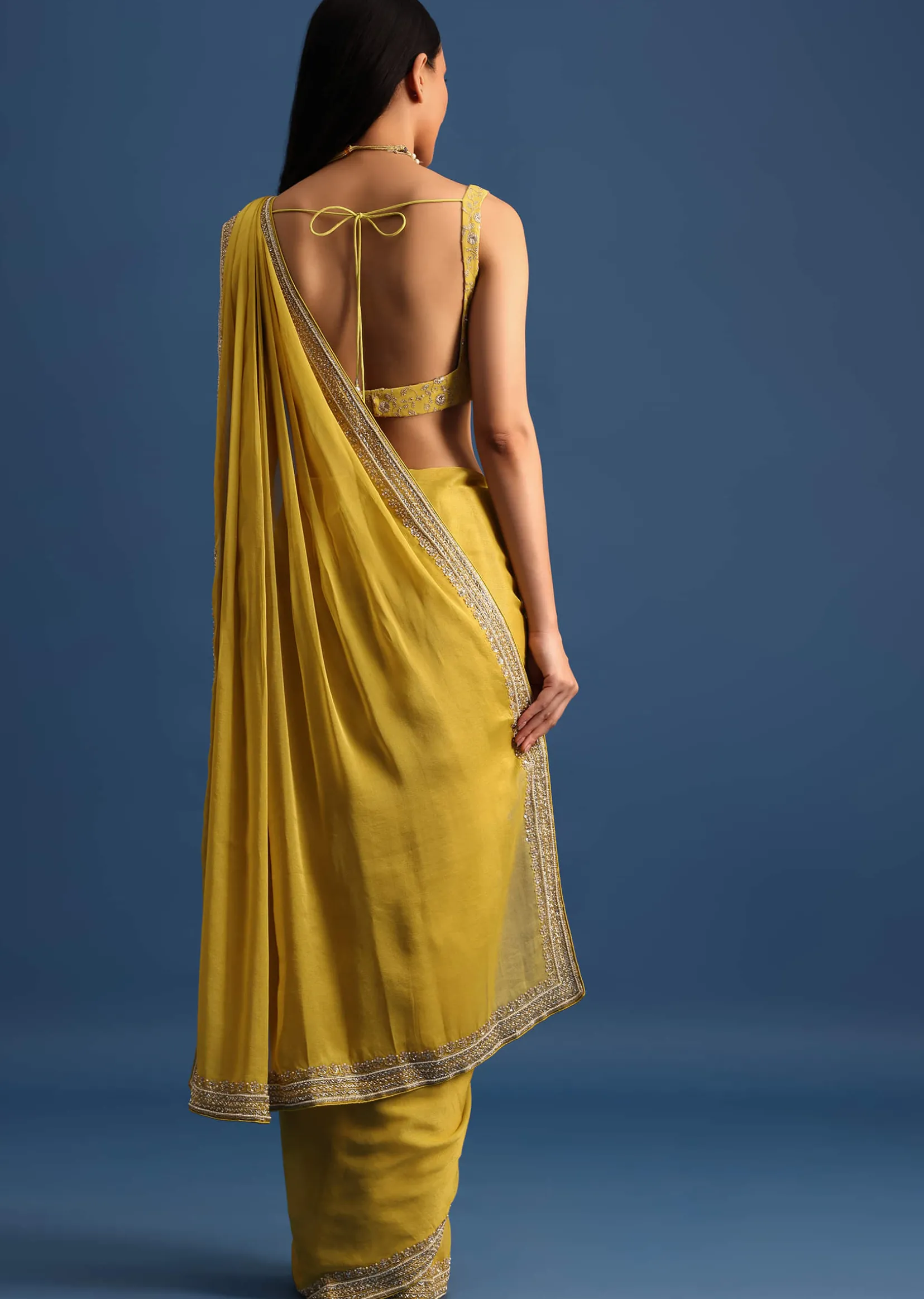 Yellow Tissue Organza Saree With Embroidered Border And Unstitched Blouse